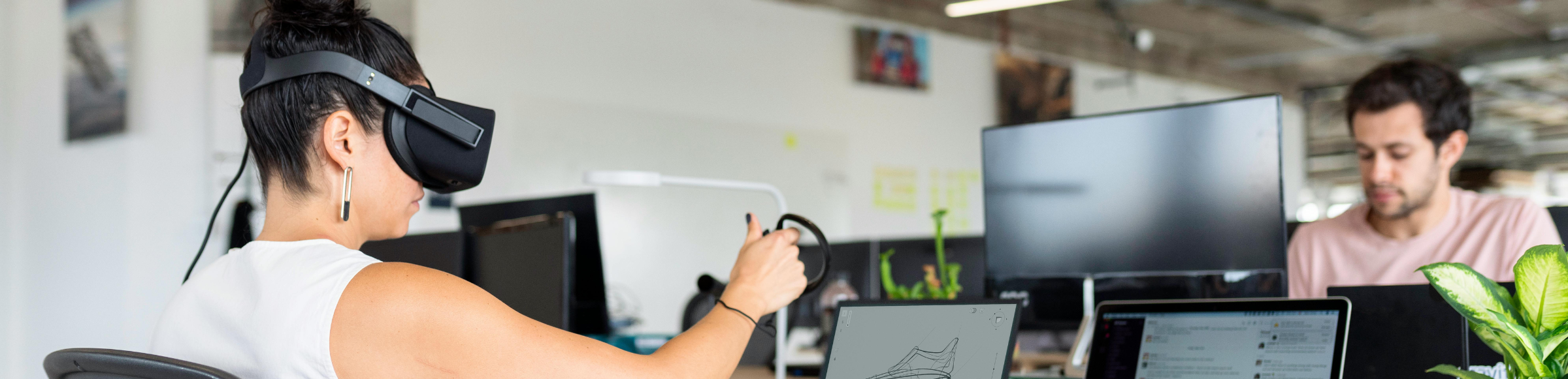 Employee in an office with VR headset 
