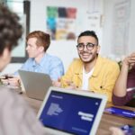 Man smiling in office